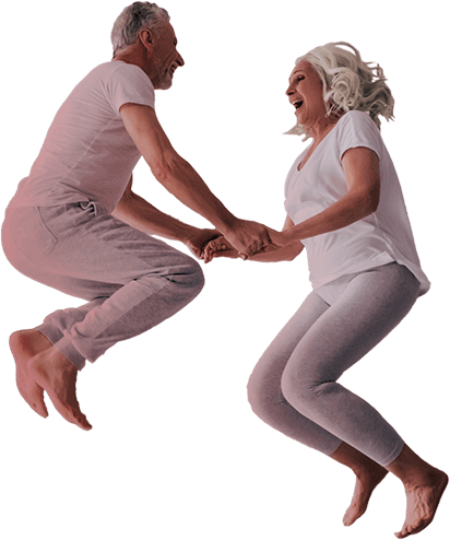 couple jumping in their pajamas
